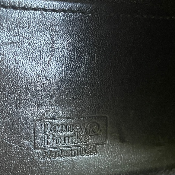 Dooney and Bourke zip along wallet in solid black. - Picture 9 of 12